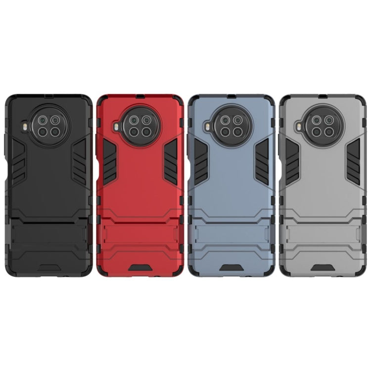 PC + TPU Shockproof Protective Case with Invisible Holder, For Xiaomi Mi 10T Lite 5G