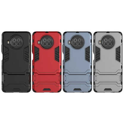 PC + TPU Shockproof Protective Case with Invisible Holder, For Xiaomi Mi 10T Lite 5G